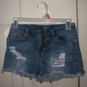 Blue ripped jean shorts
